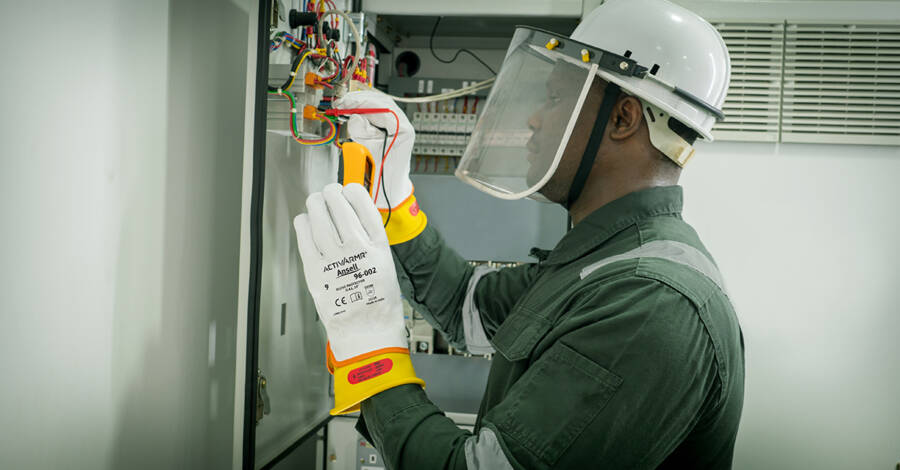man wearing ansell activarmr electrical gloves
