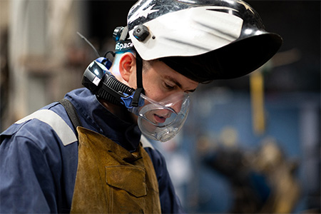 Welder wearing CleanSpace respiratory protection while welding